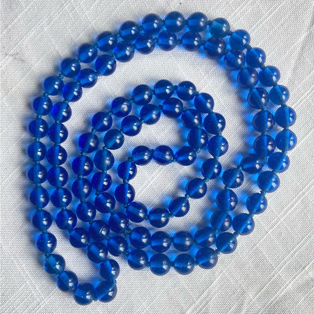 Stunning Cobalt Glass Necklace. Hand tied w/ blue silk, no clasp.